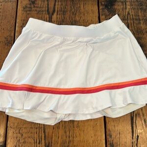 Tail athletic skirt with attached‎ shorts   Medium white with pink and orange
